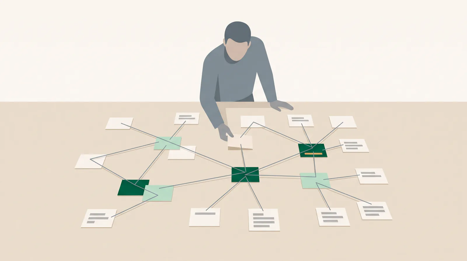 Eine Person legt eine weitere Notizkarte auf einen Tisch voller Karten, die mit Fäden zu einem Netz verbunden sind; Knotenpunkte mit vielen Verbindungen sind grün hervorgehoben.